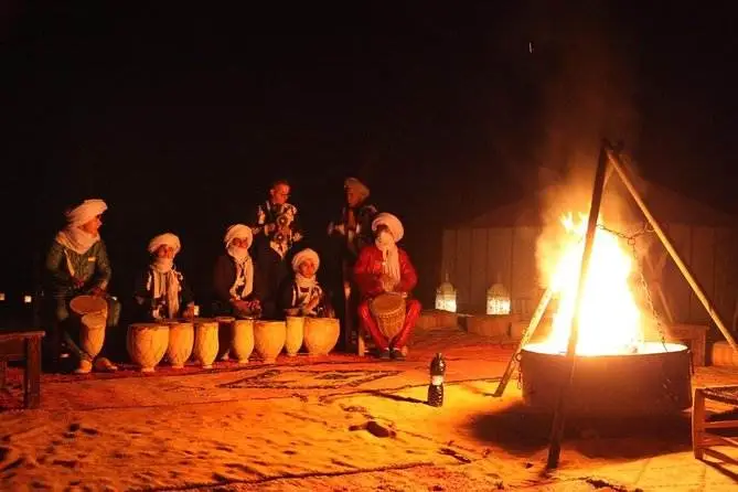 Music around the fire at the desert camp